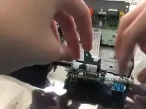 Just gently pull the ribbon cables out.