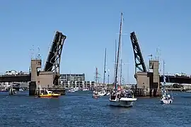A double-leaf bascule bridge fully open