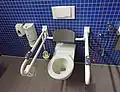 A toilet with a backrest