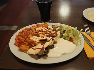 Pasta with kebab at Kebab House restaurant in Jyvaskyla, Finland