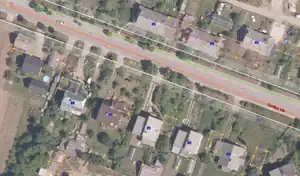 Screenshot of JOSM showing misaligned buildings in Krāslava on top of the LVM GEO orthophoto.