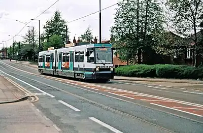 Bordering between tram, light railway and metro, Manchester Metrolink includes quite a few places with mixed traffic operation despite the use of high-floor cars.