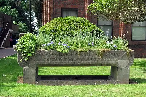 man_made=planter + historic=trough + material=concrete