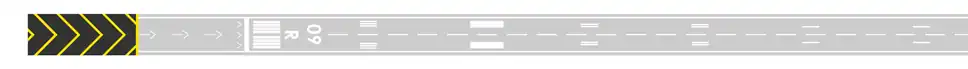 A stopway or blast pad is marked by yellow chevrons.