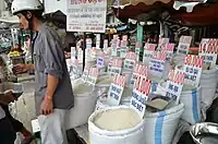 A shop selling rice next to a market in Ho Chi Minh City, Vietnam.