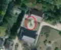 2/2 The same pagoda (man_made=tower and tower:type=pagoda) which leaves a shadow on the ground allowing it to be distinguished. The pavilions nearby are typical of Buddhist architecture (Maxar satellite imagery).