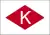 Weißes "K" in roter Raute auf weißem Grund