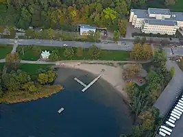 (if the building on the left side does not contain showers or changing rooms)