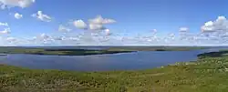 Lake Kuetsjarvi&nbsp;[no], seen from the east towards Norway. The strait between Kuetsjarvi and Svanevatn, with Salmiyarvi on the northern shore, is seen in the middle of the picture.