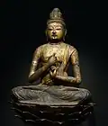 A gilt-wood statue of Vairocana Buddha, 11th-12th century.