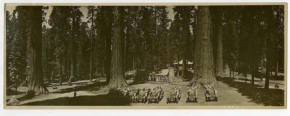 Autos in front of Clark's Station.