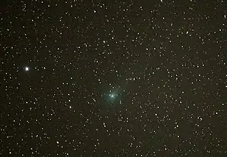 Sporting a vague tail to the 2 o'clock on 9 May 2007 from Mount Laguna. The star is Mu Draconis (mag 4.90)