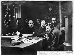 In the cabin of the "St. Foka". From the right to the left: N. V. Pinegin, M. A. Pavlov, V. Y. Wiese, N. M. Sakharov, G. Y. Sedov, M. A. Zander, P. G. Kushakov.