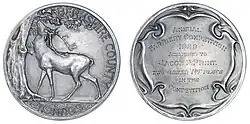 Colour photograph of a 1929 silver medal awarded by the Berkshire County Council