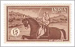 Postage stamp depicting the Rani of Jhansi on horseback in countryside