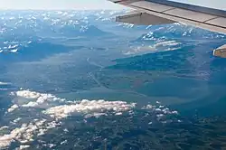 The mouth of the Alpine Rhine in Upper Lake Constance, and the Alpine Rhine Valley looking south
