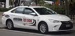 Toyota Camry Hybrid operating for Black & White Taxis