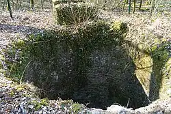 The opening of the Sainte-Magnance well.