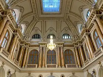 Beaux-Arts aka Eclectic - Interior of the Old National Bank of Romania Palace, Bucharest, 1883–1900, by Joseph-Marie Cassien Barnard and Albert Galleron, assisted by Grigore Cerkez and Constantin Băicoianu[38]