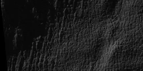 Close view of high center polygons near glacier, as seen by HiRISE under the HiWish program
