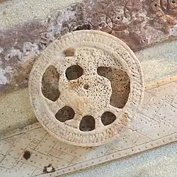 Seated figure eating