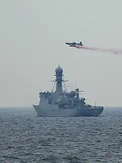 A Pilatus PC-9 simulates an airborne chemical attack against the Royal Danish Navy HDMS Thetis (F357) during BALTOPS '13, on 13 June 2013.