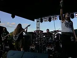 Image of band onstage in 2016