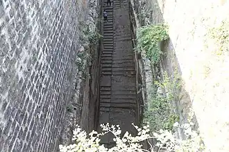 Steps leading to well