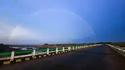 Beautiful Agalpur bridge with rainbow on Ang river