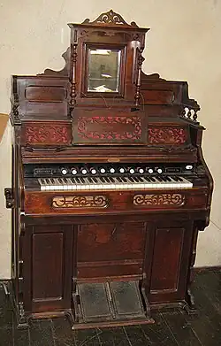Parlor organ:[43][44][45] melodeon or American reed organ by American Reed Organ Co., Rotterdam[45]