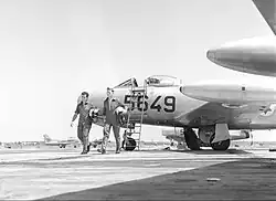 Two Israeli pilots after getting out of their Dassault Ouragan fighter jets at Hatzor in July 1956 (A. Lapidot right)