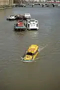 Amphibious tour bus&nbsp;– a converted DUKW&nbsp;– on Thames river in London near Lambeth Bridge.