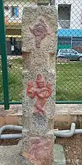 Ancient stone pillar bearing sculptures of Venugopala, Shankha and a Dancer discovered at the Chikkabanavara Kalyani.