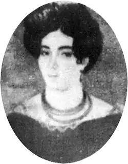 Miniature portrait of a young, dark-haired lady wearing a lace-trimmed dress and necklace