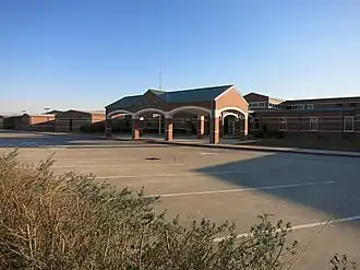 Heritage Rose Elementary School of Fort Bend ISD is on Glendale Lakes Drive to the south of Arcola.
