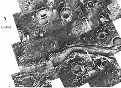 Ares Vallis, capture by Viking and edited as a false color image. The channel is 25&nbsp;km wide and about 1&nbsp;km deep. It would be quite spectacular to walk down this valley.