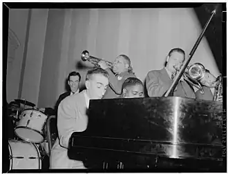Hodes (left) on the piano with Pete Johnson.