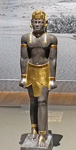 Aspelta statue reconstruction, with Egyptian headdress. Louvre Museum