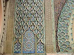 Detail of the darj-wa-ktaf and zellij decoration of the gate