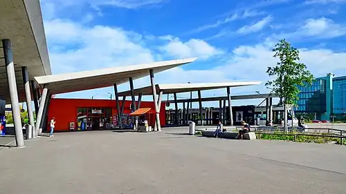 Wide, paved area with canopies