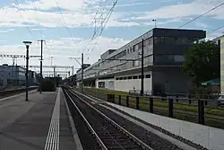 The station looking west, with Glattalbahn platforms visible to right