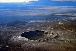 Image 23Meteor Crater in Arizona. Created 50,000 years ago by an impactor about 50 metres (160&nbsp;ft) across, it shows that the accretion of the Solar System is not over. (from Formation and evolution of the Solar System)