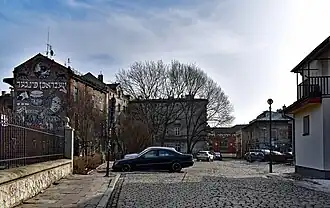Bawół Square. The mural takes inspiration from art nouveau era artist Ephraim Moses Lilien