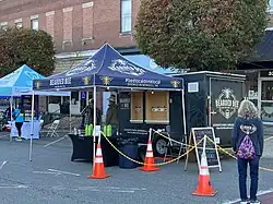 A small booth set up by the Bearded Bee