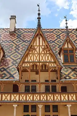 Gothic&nbsp;– Hôtel-Dieu de Beaune, Beaune, France, by Jacques Wiscrère, 1451[28]