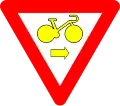 B22: Bike may pass a yellow or red light to turn right, after yield