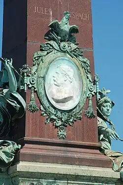 White marble medallion with Jules Anspach's effigy by Paul De Vigne