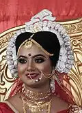 Bengali bride wearing rouge