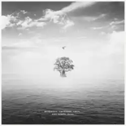 A tree in the middle of a sea under cloudy sky