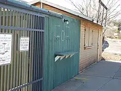 The original ticket booth made of wood of the Warren Ballpark.